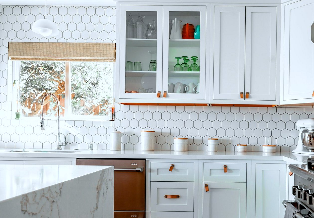 White hexagonal tiles on a kitchen splashback